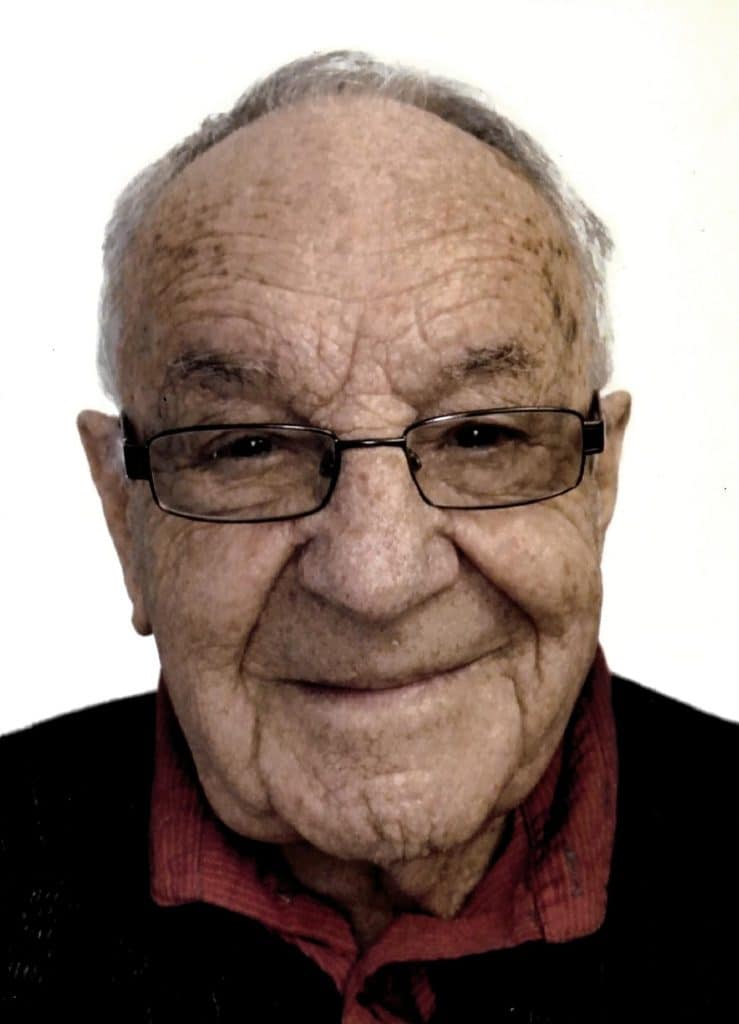 André T Godin